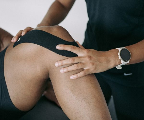 Applying KT Tape to a knee Applying KT Tape to a knee